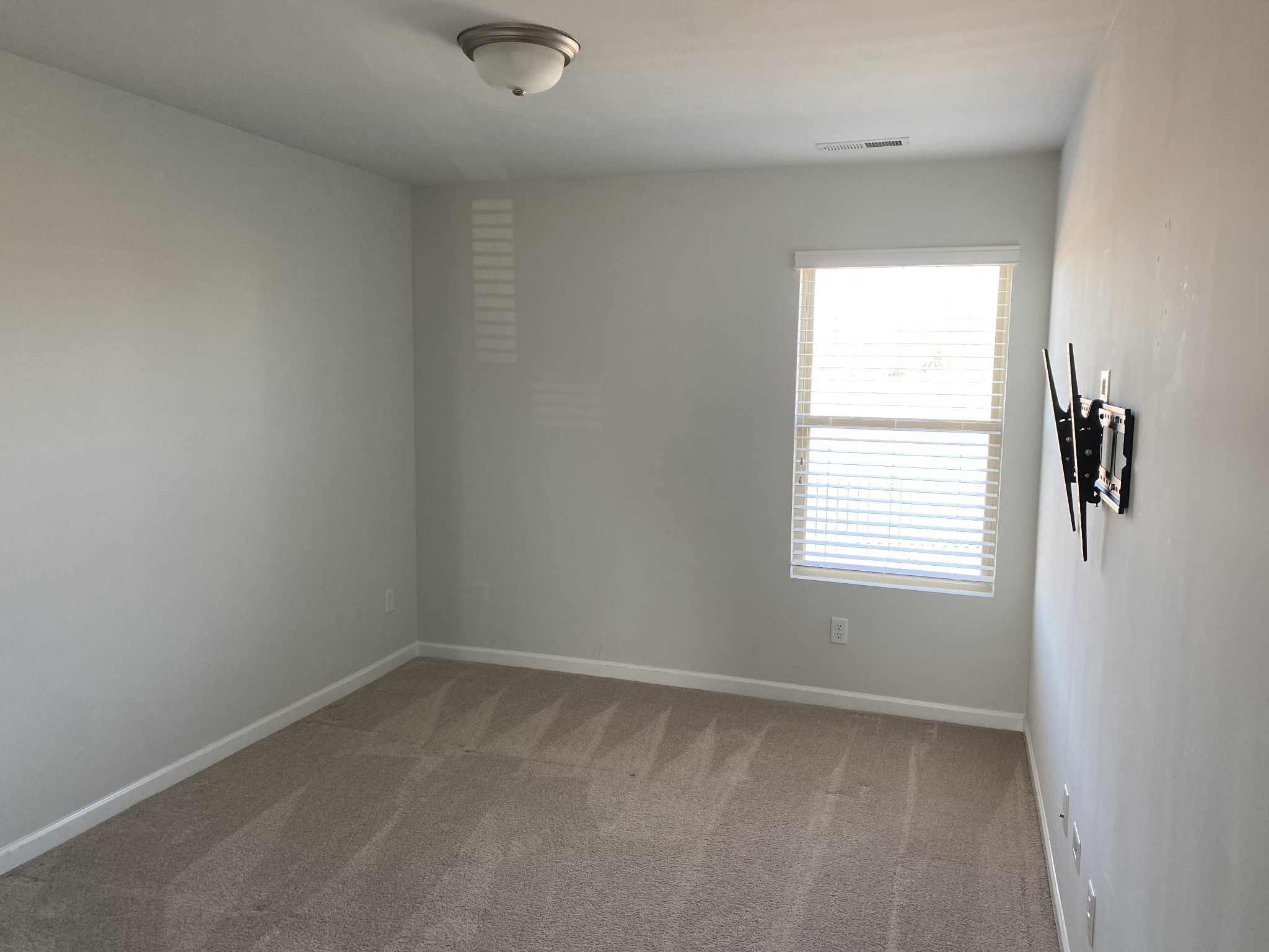 1024 Lonergan Circle Spring Hill, TN 37174 - Photo 3 of 8 an empty room with a window