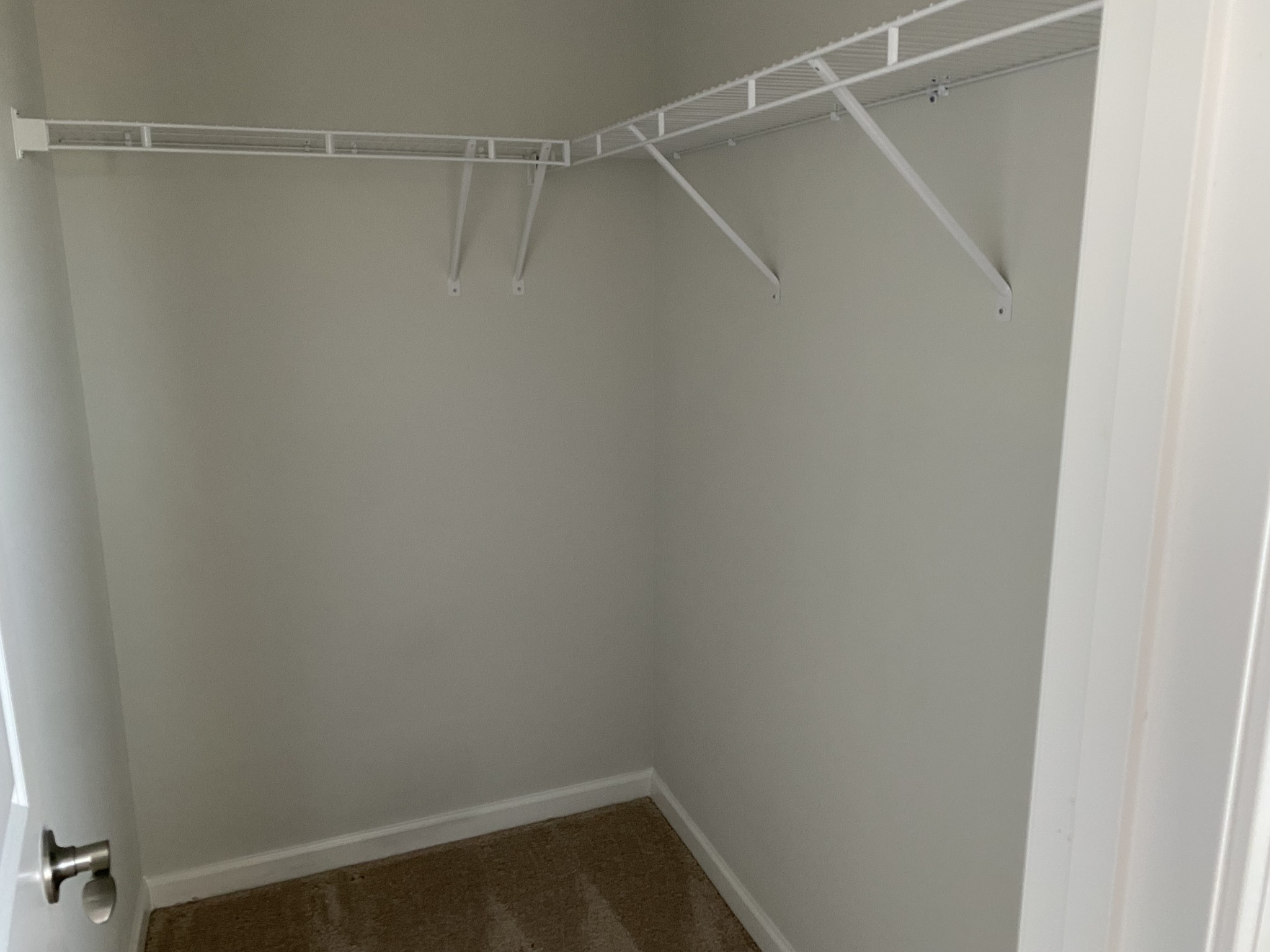 1024 Lonergan Circle Spring Hill, TN 37174 - Photo 5 of 8 a view of an empty walk in closet