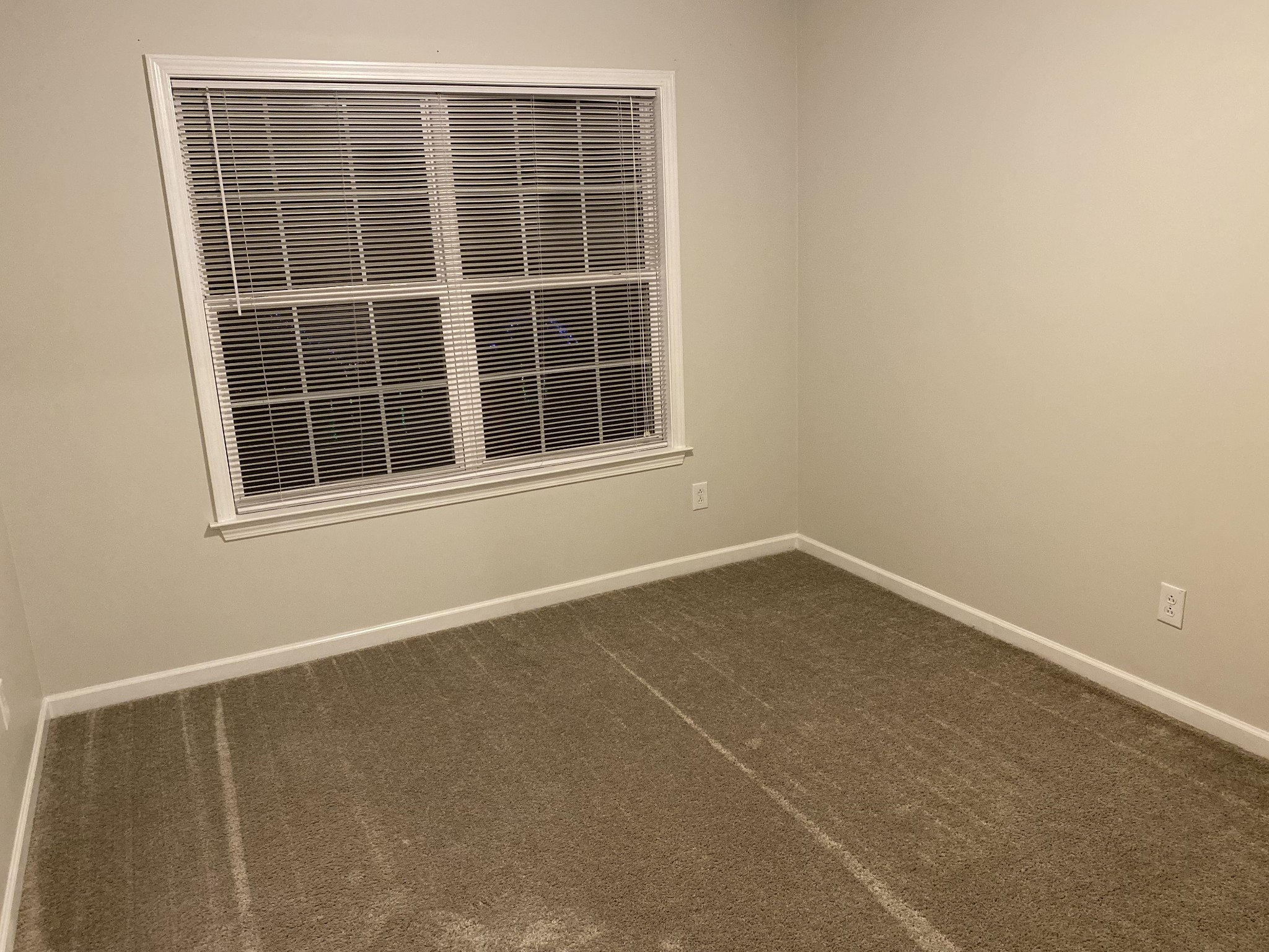 1024 Lonergan Circle Spring Hill, TN 37174 - Photo 7 of 8 a view of an empty room with a window