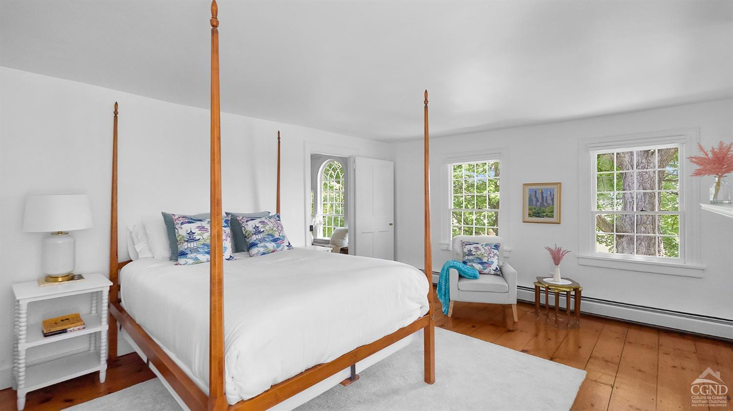 7 Thomas Road Chatham, NY 12184 - Photo 11 of 25 a bedroom with a bed and a table in it