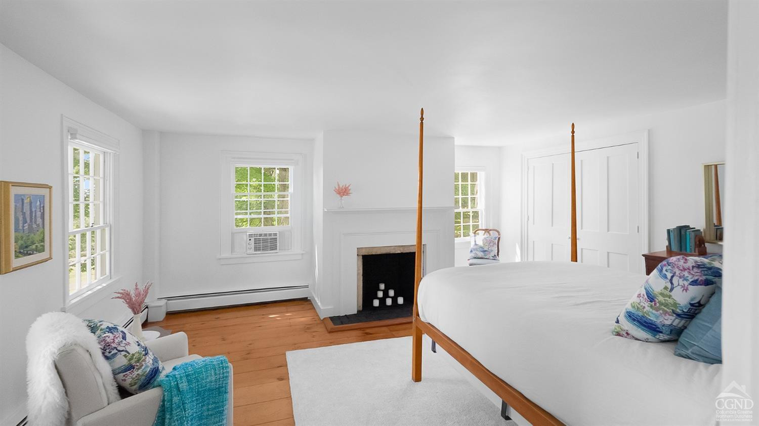 7 Thomas Road Chatham, NY 12184 - Photo 12 of 25 a bedroom with furniture and a fireplace