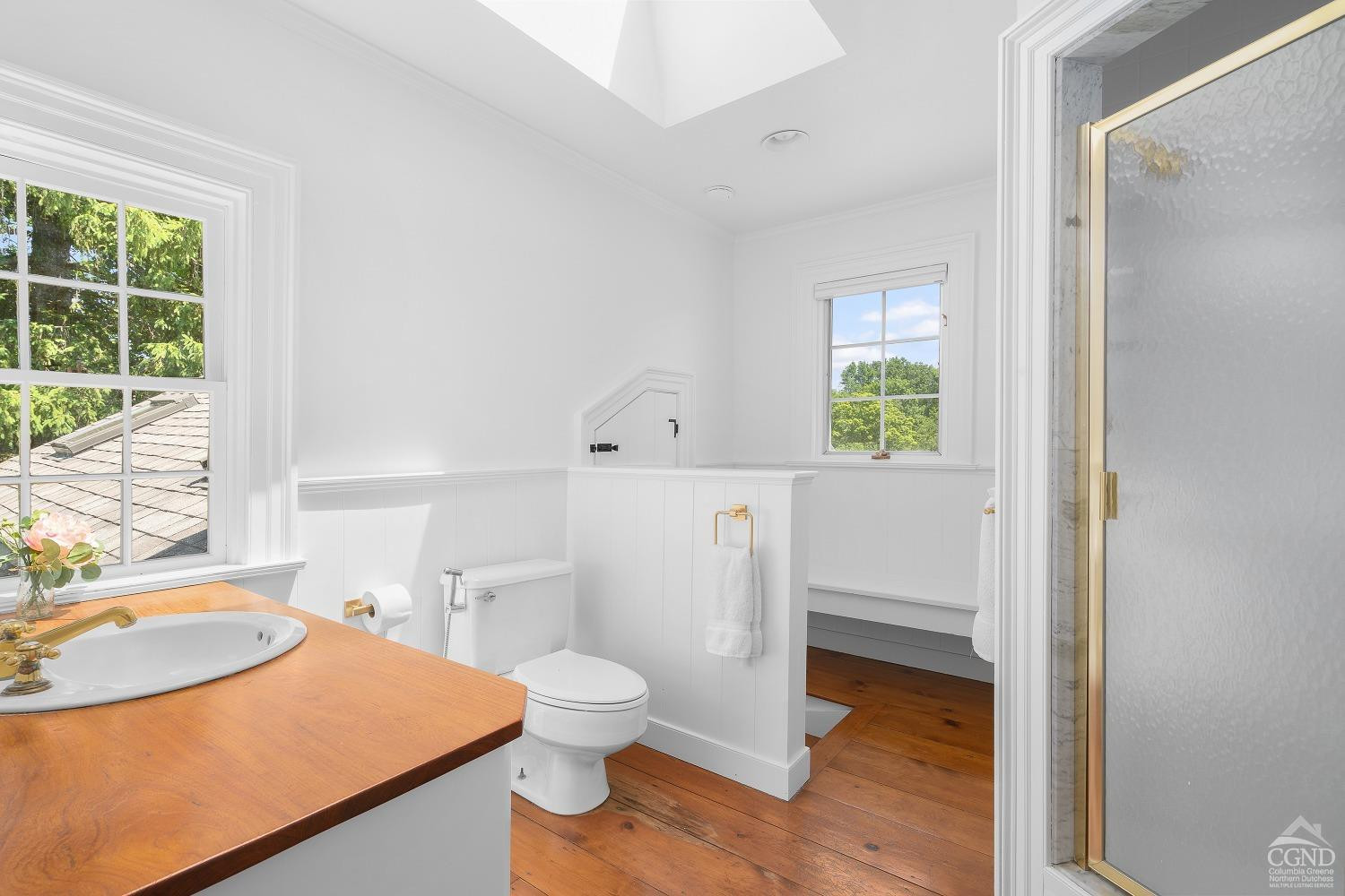 7 Thomas Road Chatham, NY 12184 - Photo 15 of 25 a white toilet sitting next to a bathroom sink