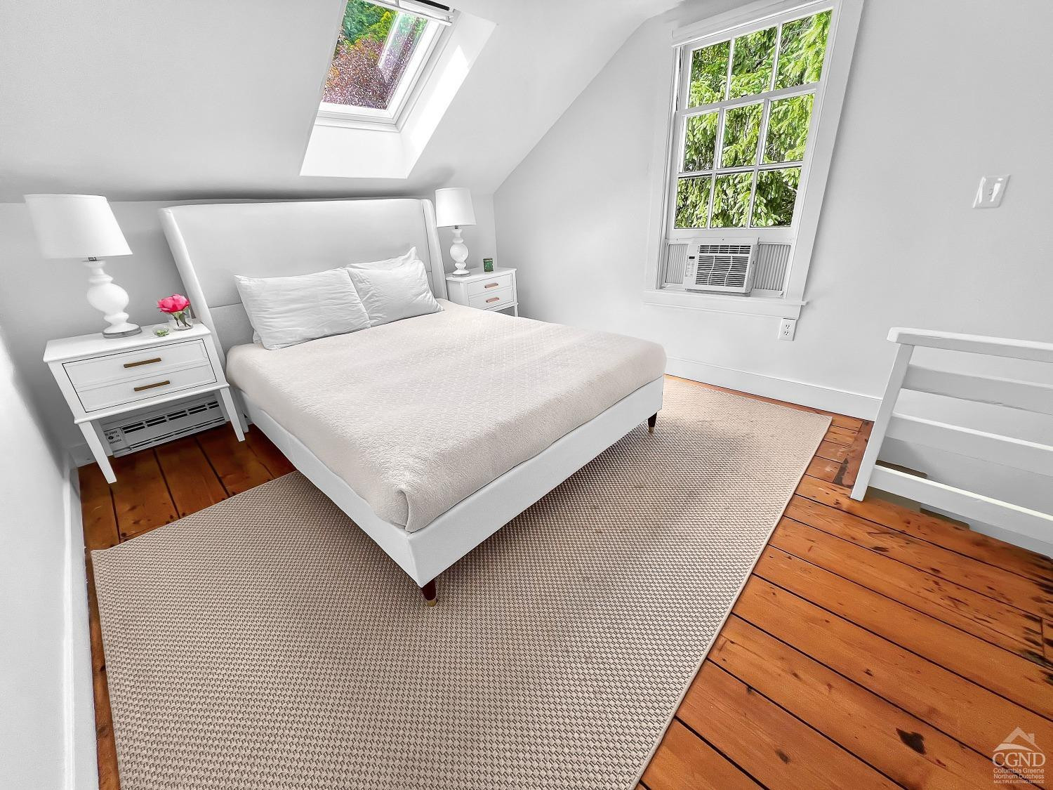 7 Thomas Road Chatham, NY 12184 - Photo 18 of 25 a bedroom with a bed and a window