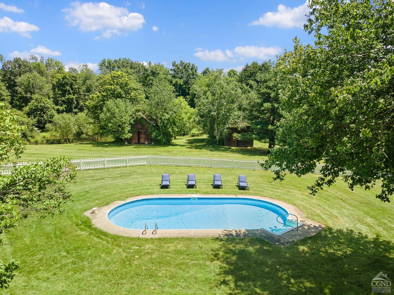 7 Thomas Road Chatham, NY 12184 - Photo 21 of 25 a view of a swimming pool with a yard