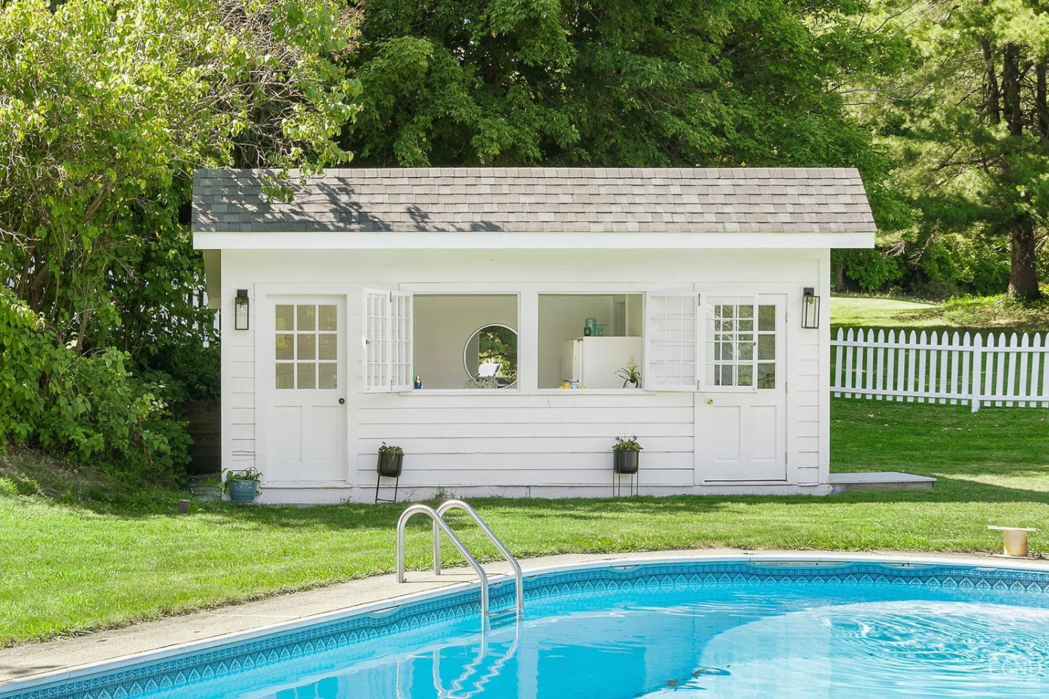7 Thomas Road Chatham, NY 12184 - Photo 22 of 25 a front view of a house with a yard