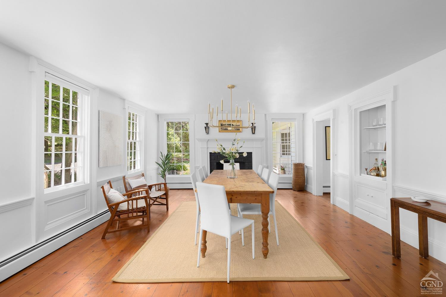 7 Thomas Road Chatham, NY 12184 - Photo 6 of 25 a living room with furniture a dining table and a large window