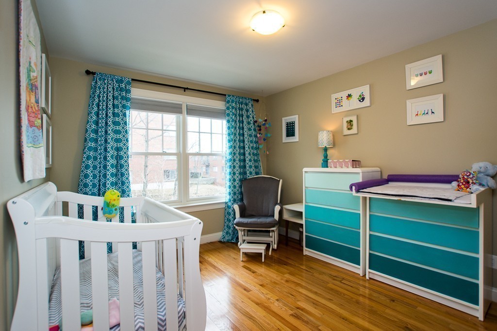 45 Selkirk Road, Unit C Boston, MA 02135 - Photo 11 of 19 a view of a workspace with furniture and a window