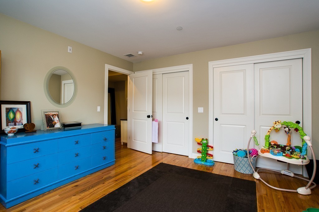 45 Selkirk Road, Unit C Boston, MA 02135 - Photo 13 of 19 a view of a kids room with toys
