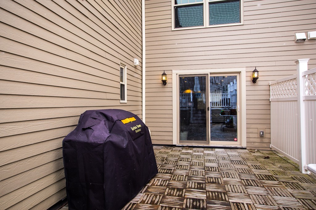 45 Selkirk Road, Unit C Boston, MA 02135 - Photo 19 of 19 a view of a house with a door and wooden floor