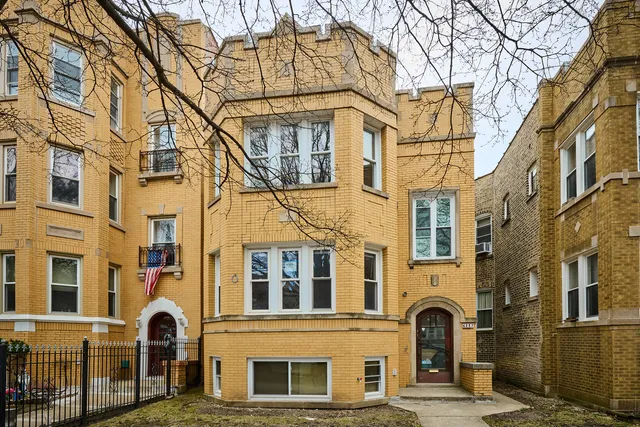 a front view of a multi story residential apartment building