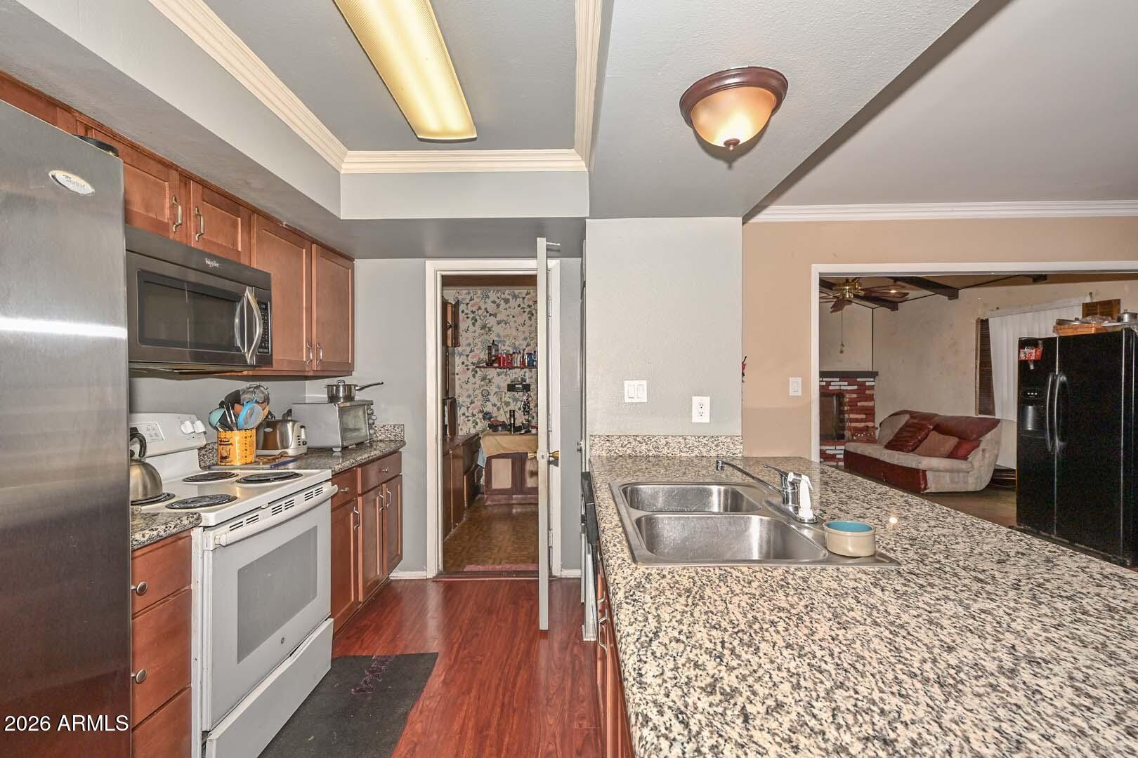 3630 North 86th Avenue Phoenix, AZ 85037 - Photo 16 of 42 Kitchen-Laundry