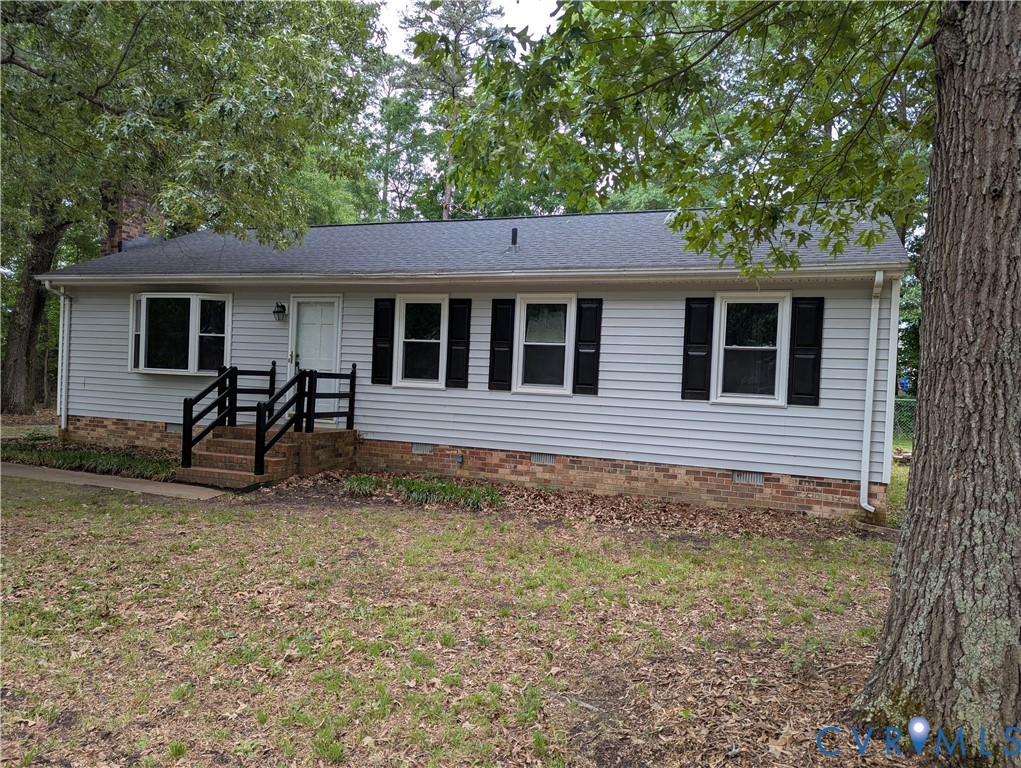 2597 Varney Road Henrico, VA 23231 - Photo 2 of 26 a house that has a tree in front of it