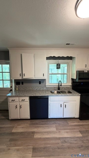 2597 Varney Road Henrico, VA 23231 - Photo 6 of 26 a kitchen with stainless steel appliances granite countertop a stove and a sink