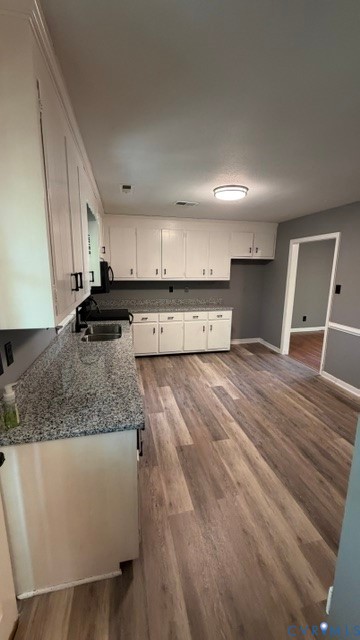 2597 Varney Road Henrico, VA 23231 - Photo 7 of 26 a kitchen with stainless steel appliances granite countertop a sink refrigerator and cabinets