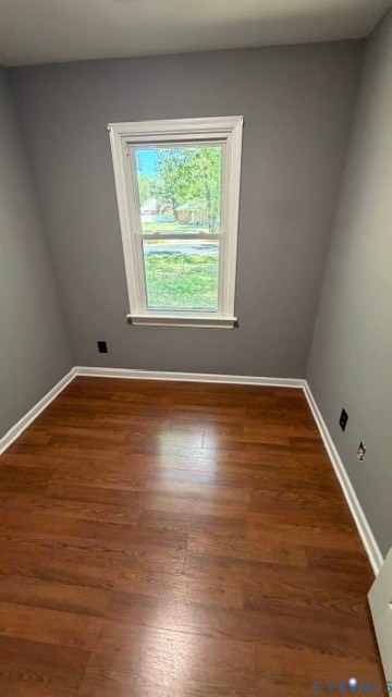 2597 Varney Road Henrico, VA 23231 - Photo 9 of 26 an empty room with wooden floor and windows