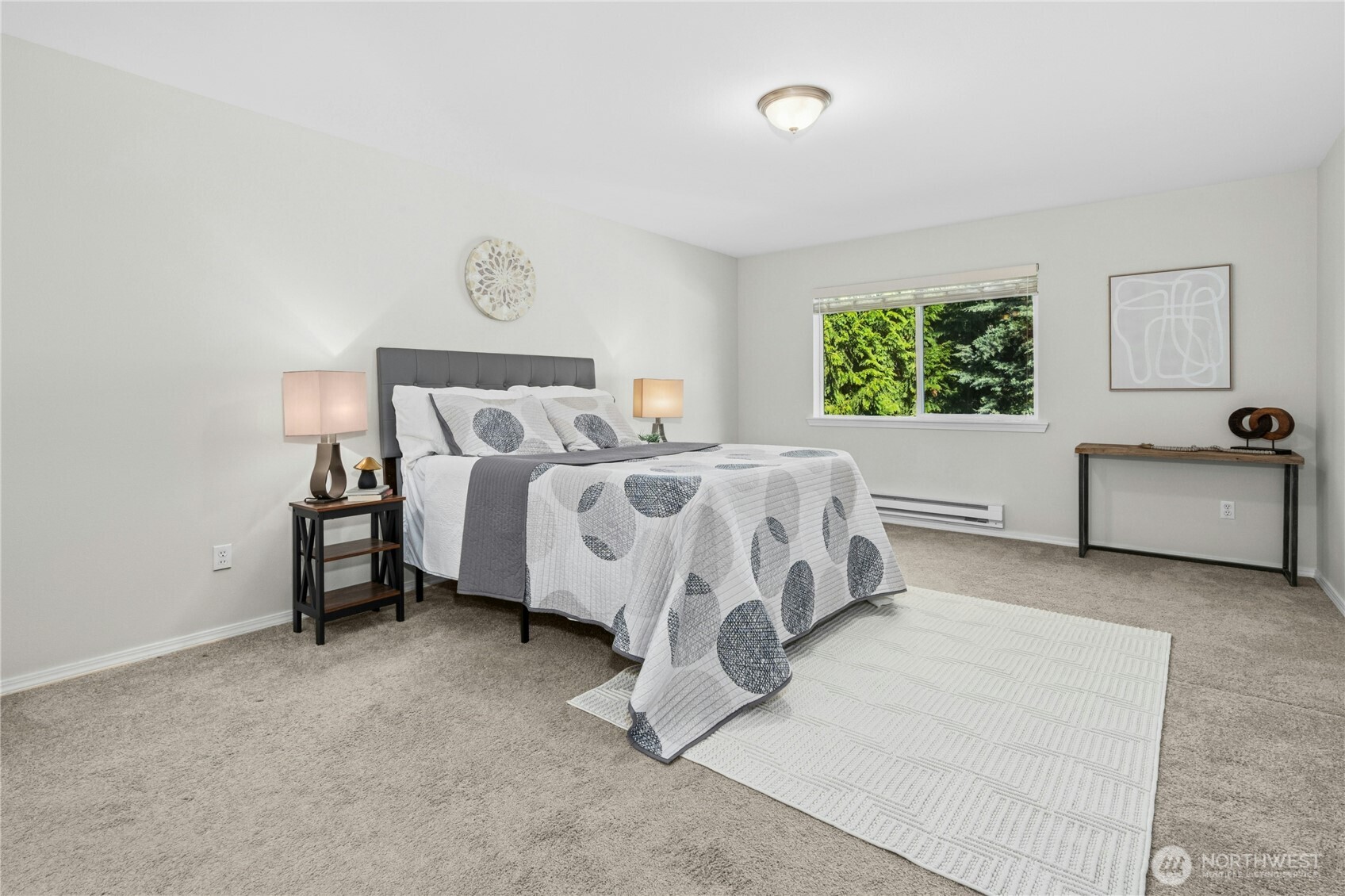 725 115th Street Southwest, Unit BB 204 Everett, WA 98204 - Photo 14 of 31 a bed room with a bed and a couch