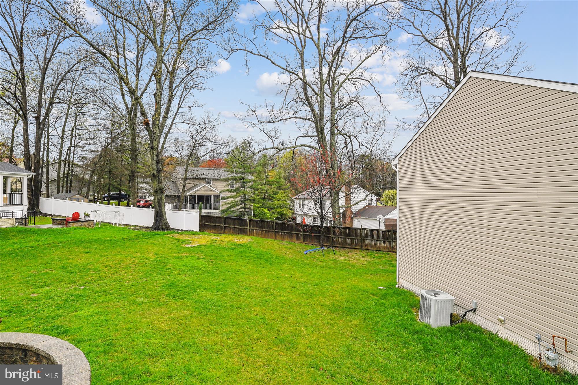 5958 Florey Road Hanover, MD 21076 - Photo 10 of 77 a view of a backyard with large tree
