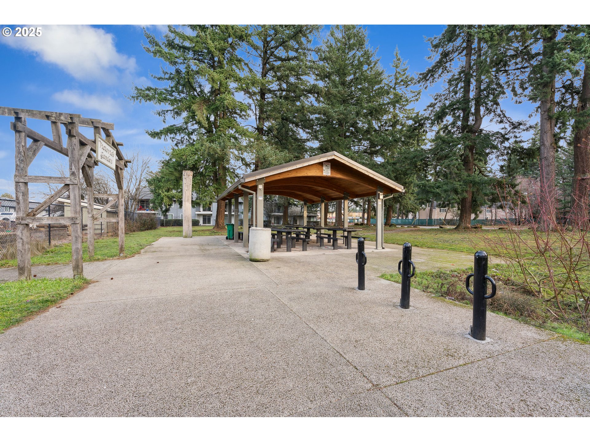 4089 Southwest McKinley Street Gresham, OR 97080 - Photo 24 of 25 a view of a park with plants and a bench