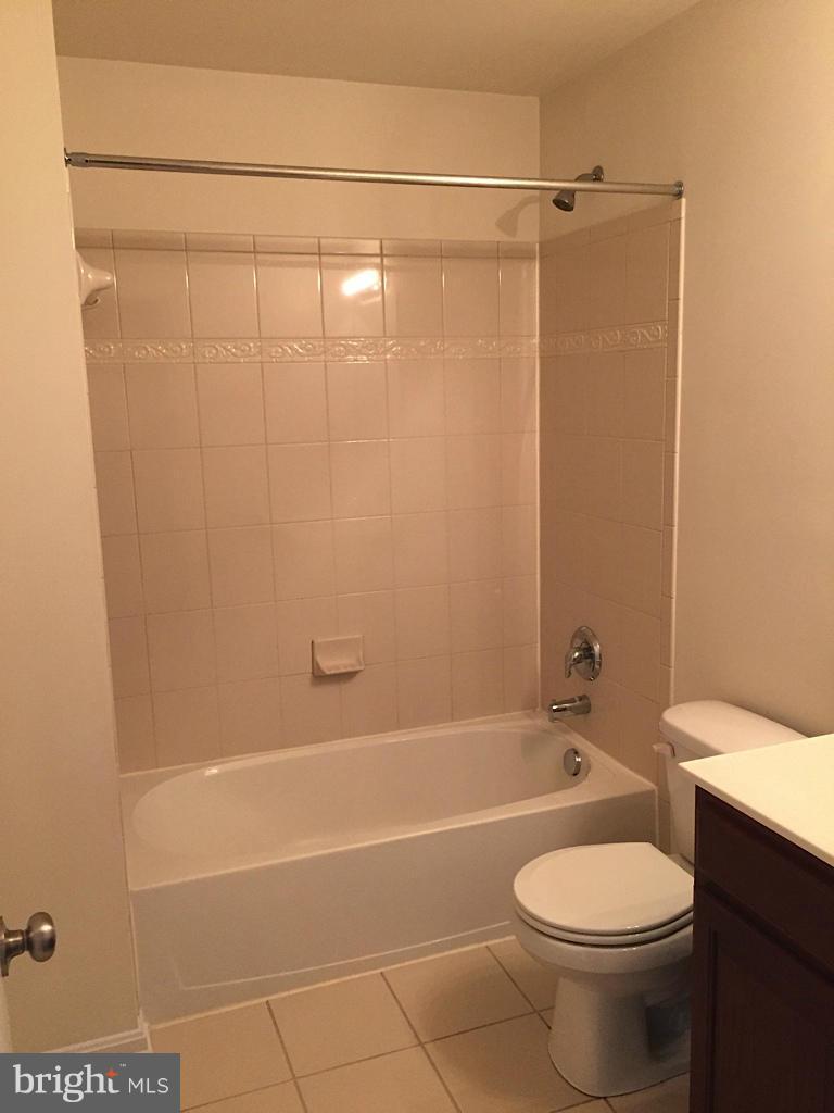 74 Backstretch Way Prince Frederick, MD 20678 - Photo 11 of 21 a bathroom with a toilet and shower