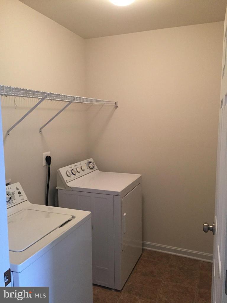 74 Backstretch Way Prince Frederick, MD 20678 - Photo 12 of 21 a utility room with dryer and washer
