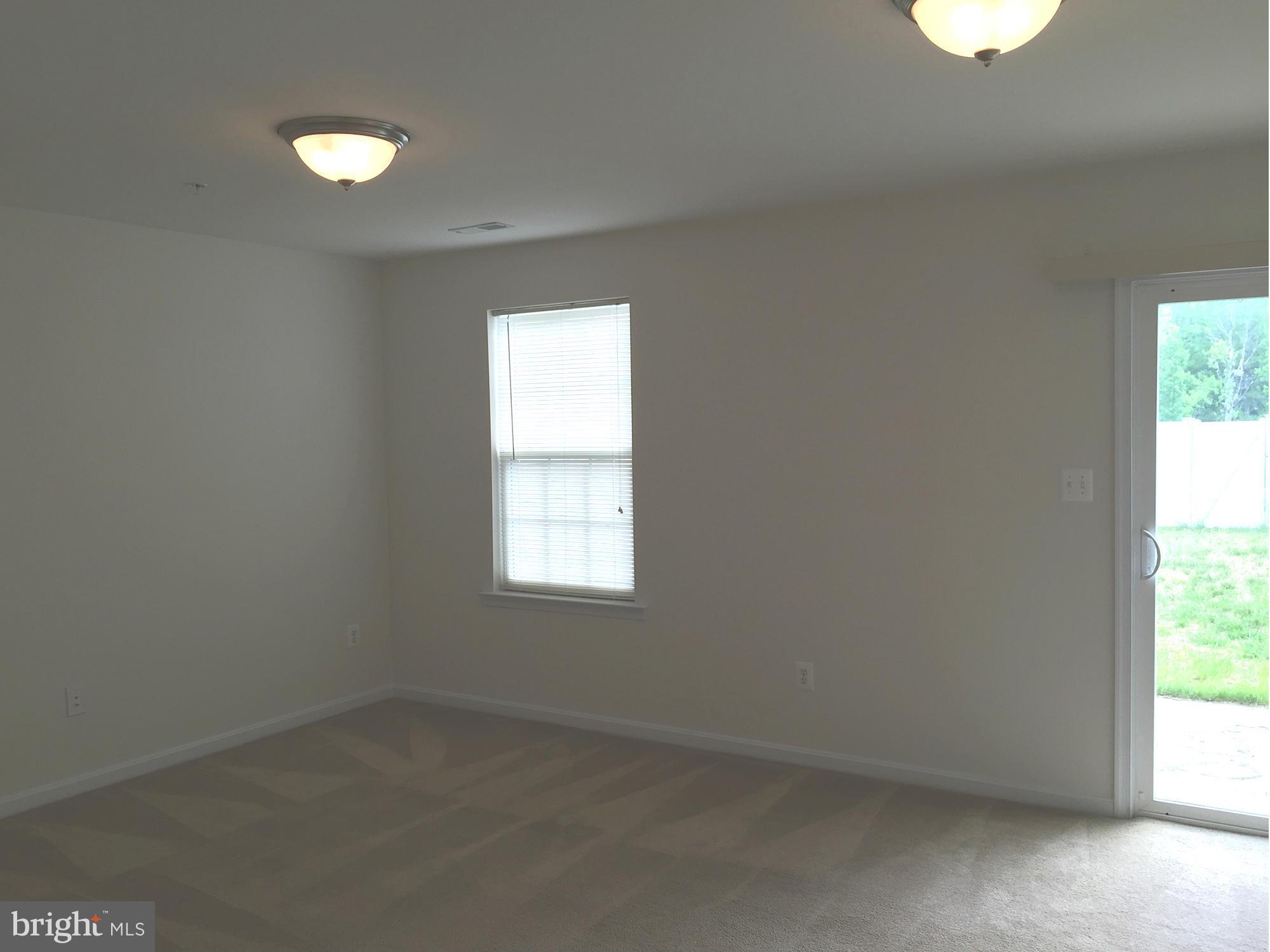 74 Backstretch Way Prince Frederick, MD 20678 - Photo 18 of 21 an empty room with a window
