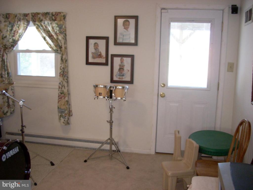 152 April Lane, Unit 17543 Lititz, PA 17543 - Photo 4 of 9 a view of a room with windows