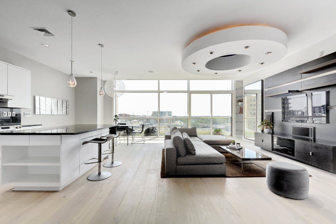 555 East 5th Street, Unit 723 Austin, TX 78701 - Photo 3 of 18 a living room with furniture and a large window
