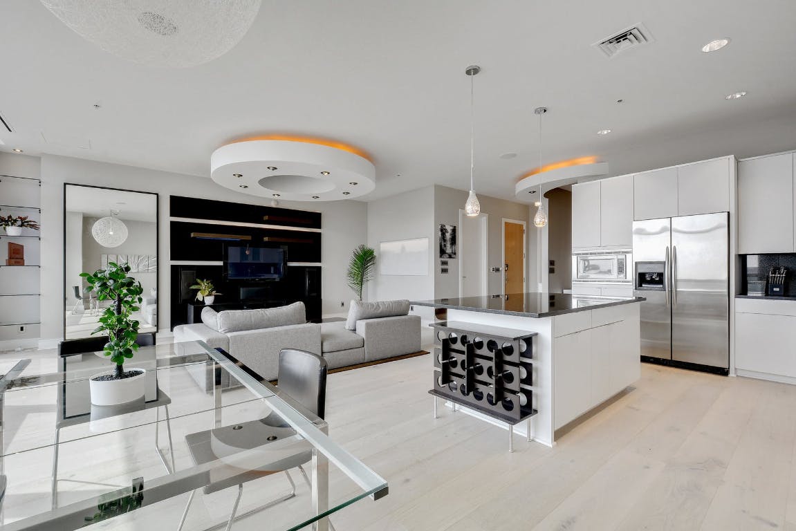 555 East 5th Street, Unit 723 Austin, TX 78701 - Photo 5 of 18 a living room with furniture and a fireplace