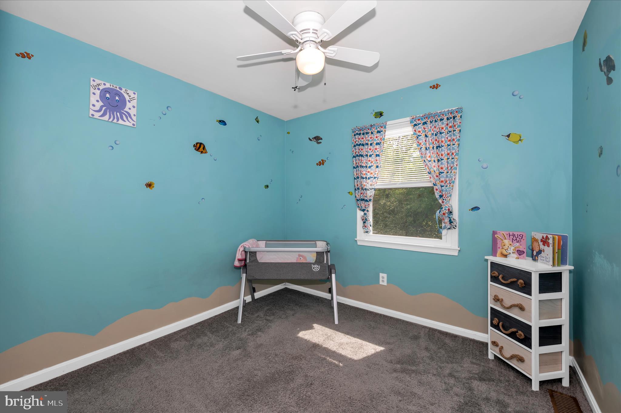 10120 Nightingale Street Gaithersburg, MD 20882 - Photo 30 of 56 a room with furniture and a window