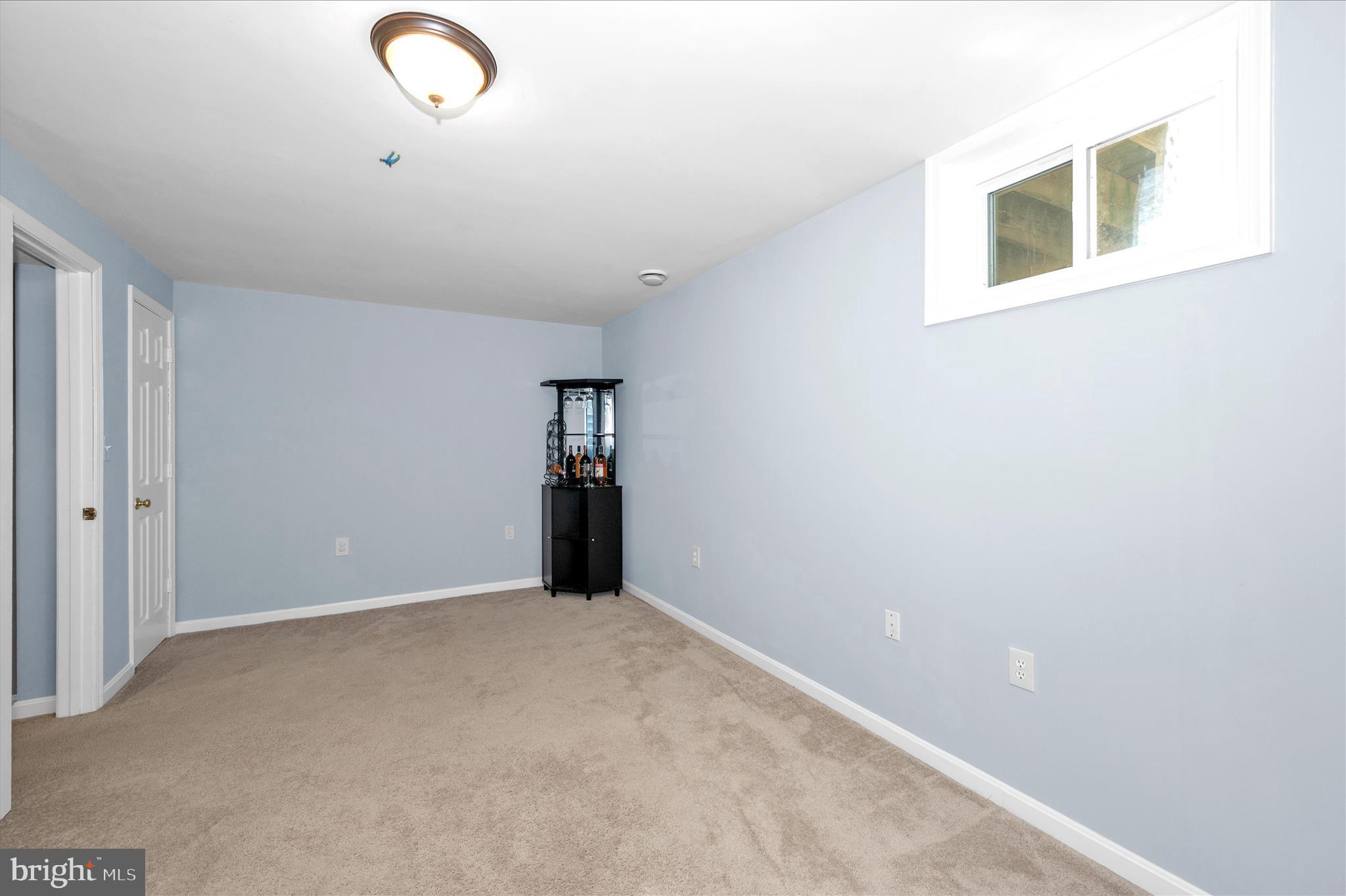 10120 Nightingale Street Gaithersburg, MD 20882 - Photo 40 of 56 a view of an empty room with kitchen