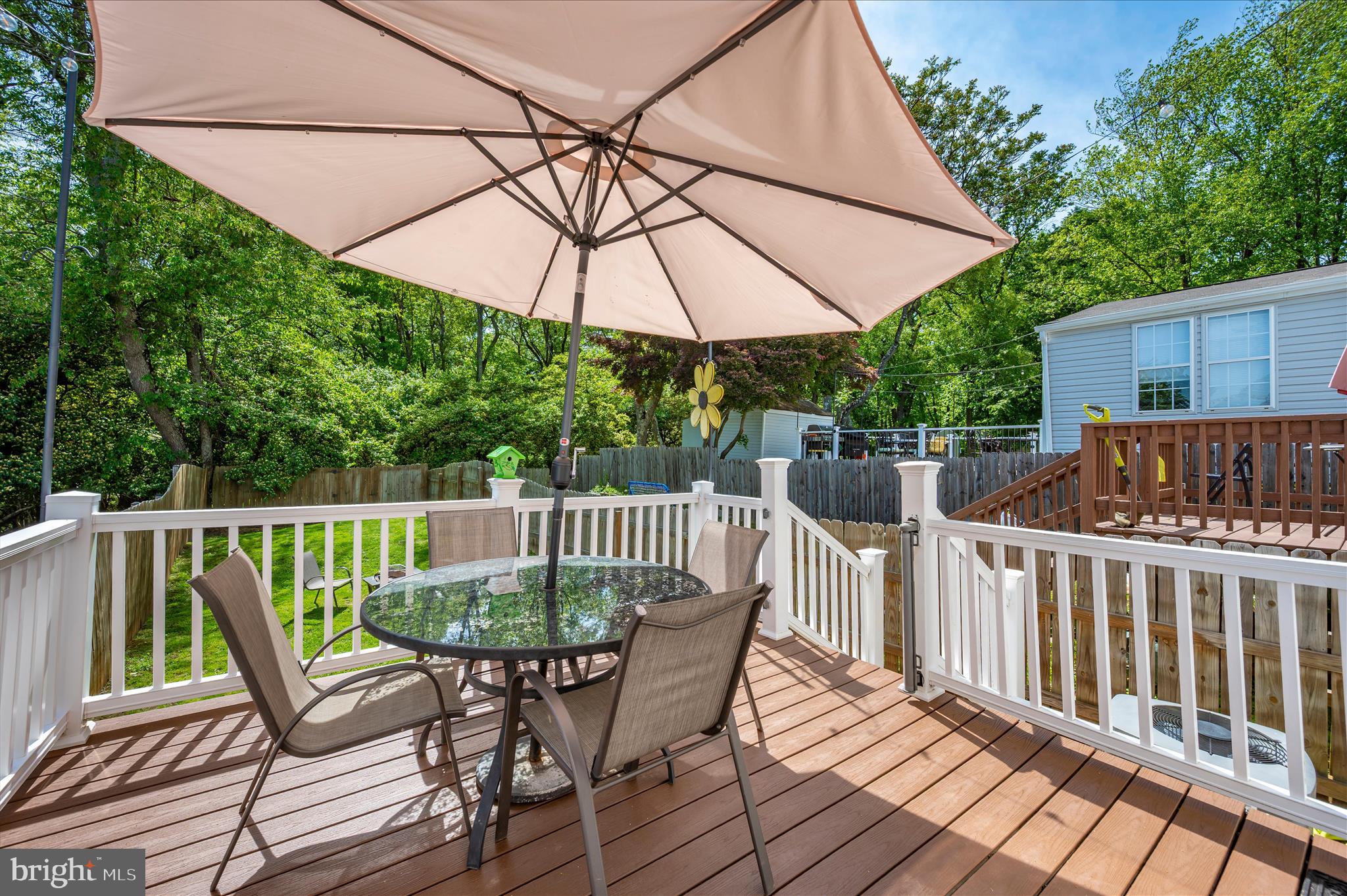 10120 Nightingale Street Gaithersburg, MD 20882 - Photo 44 of 56 a view of a chair and table on the deck