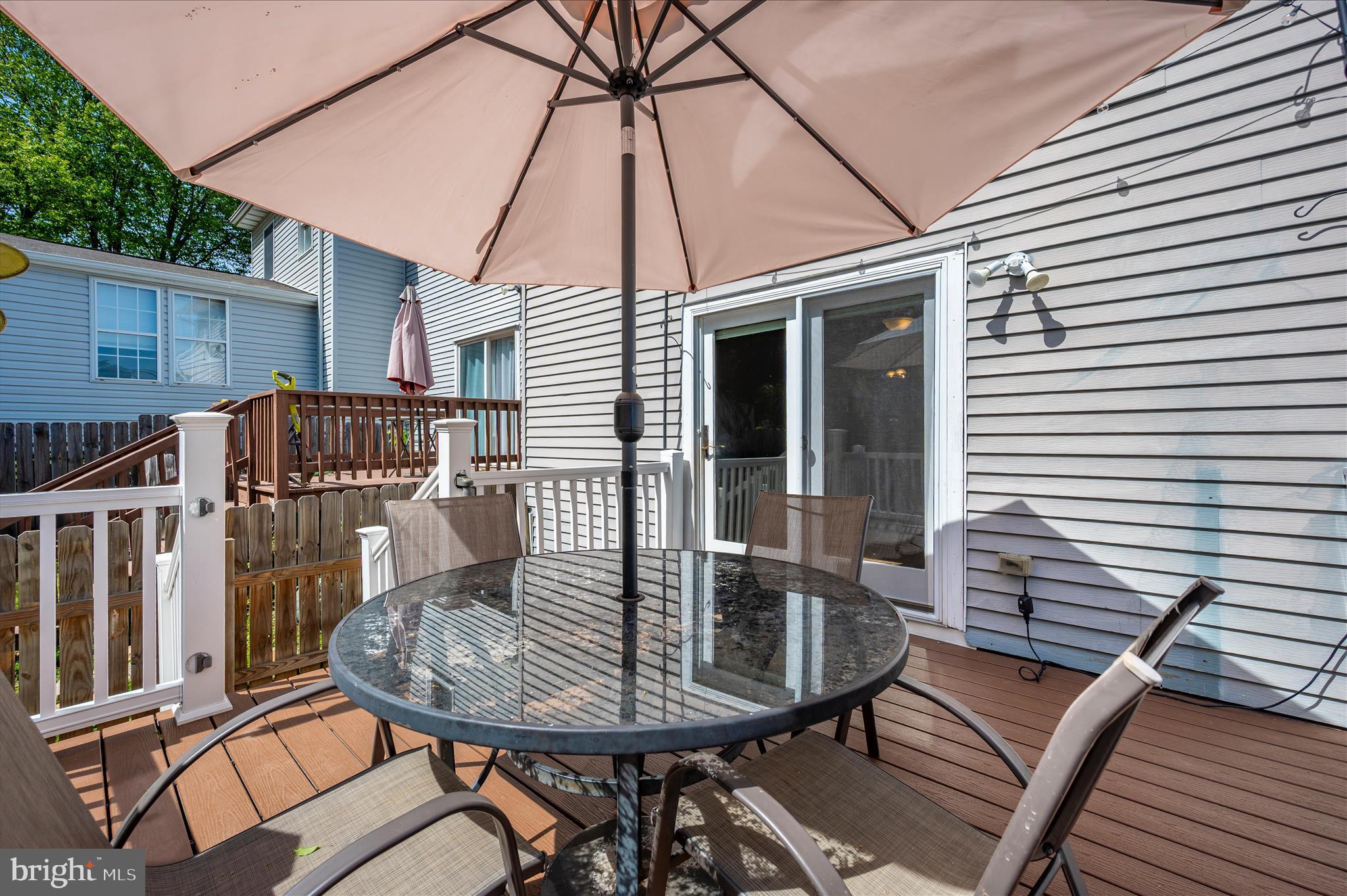 10120 Nightingale Street Gaithersburg, MD 20882 - Photo 45 of 56 a view of deck with a table and chairs