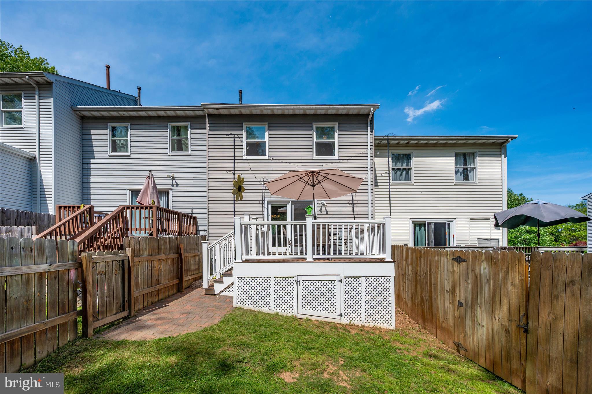 10120 Nightingale Street Gaithersburg, MD 20882 - Photo 49 of 56 a front view of a house with a yard