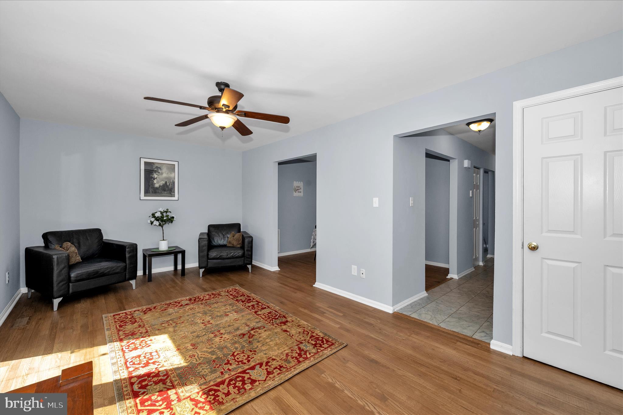 10120 Nightingale Street Gaithersburg, MD 20882 - Photo 8 of 56 a living room with furniture and wooden floor