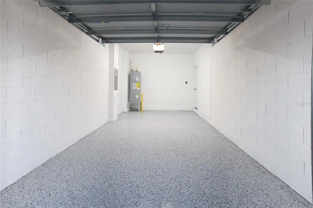 a view of a storage & utility room with closet