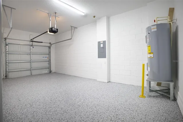 a backyard of a house with plants and garden