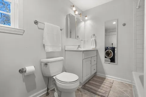 a bathroom with a toilet and a sink