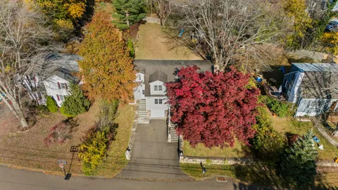 a view of a house with backyard