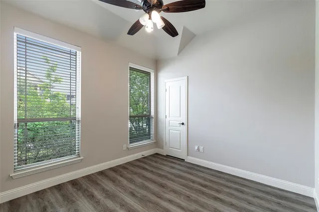 a view of room window and wooden floor