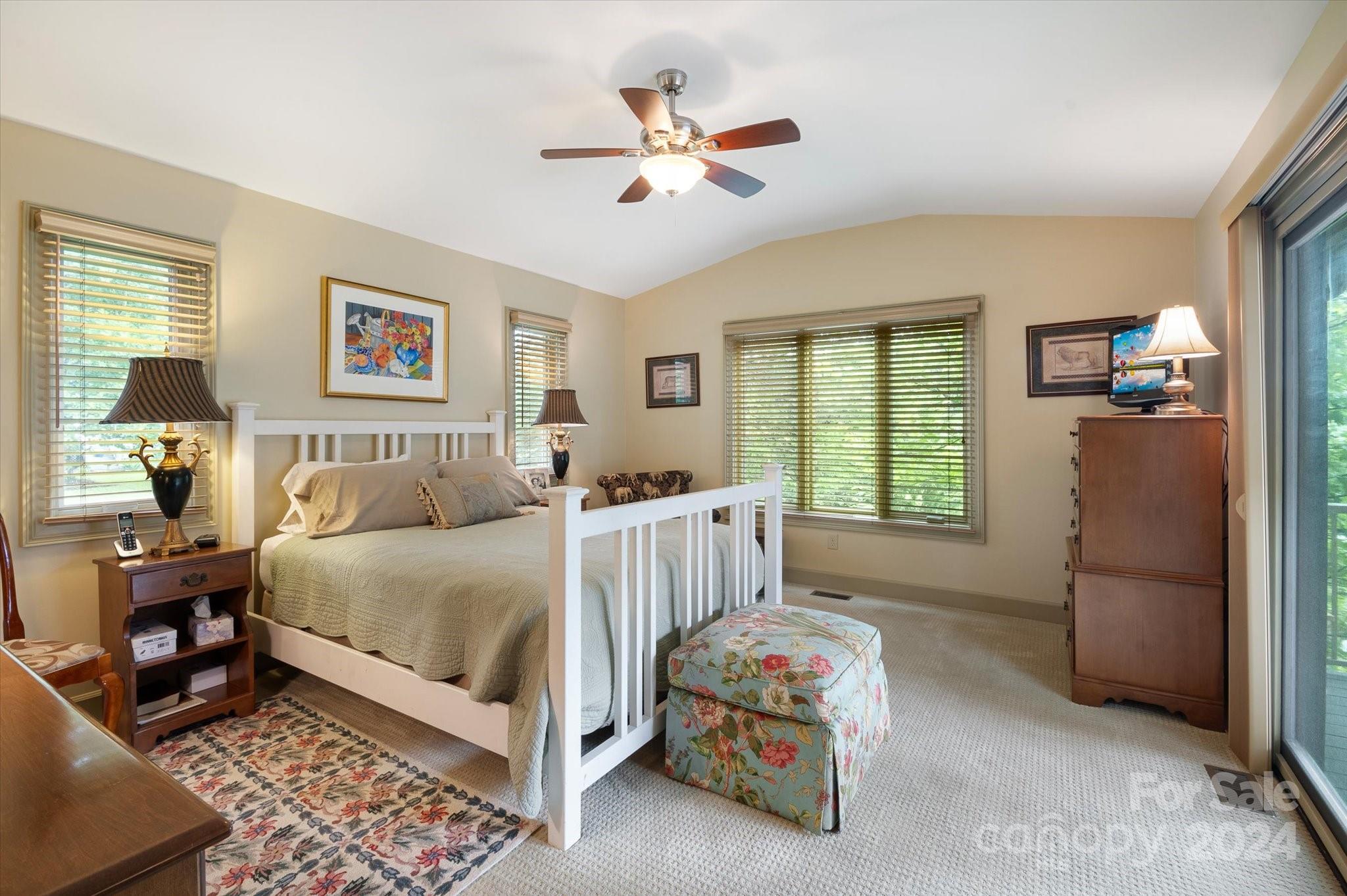 990 Club Road Tryon, NC 28782 - Photo 24 of 30 a bedroom with a bed and a window