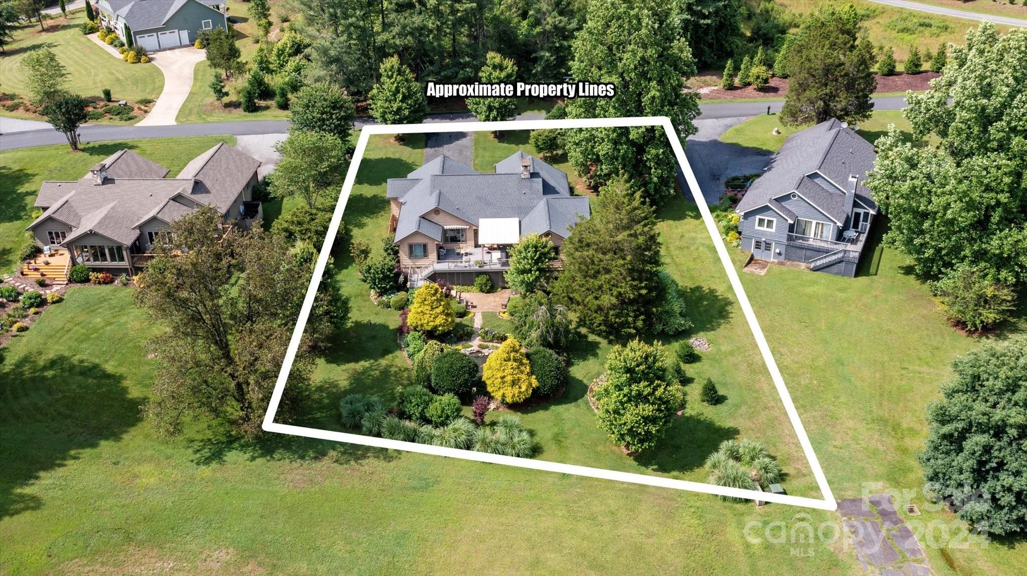 990 Club Road Tryon, NC 28782 - Photo 3 of 30 an aerial view of house with swimming pool