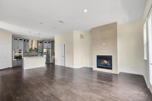 a view of kitchen with furniture and a fireplace