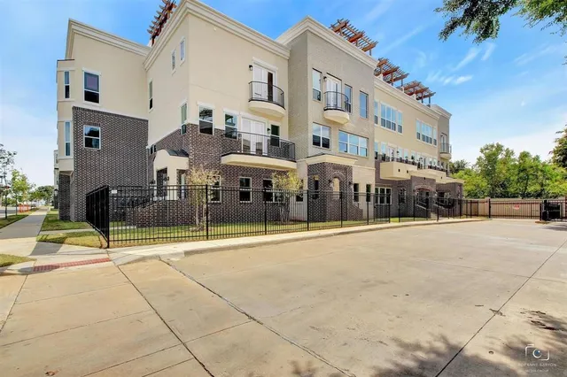 a view of an buildings with a swimming pool