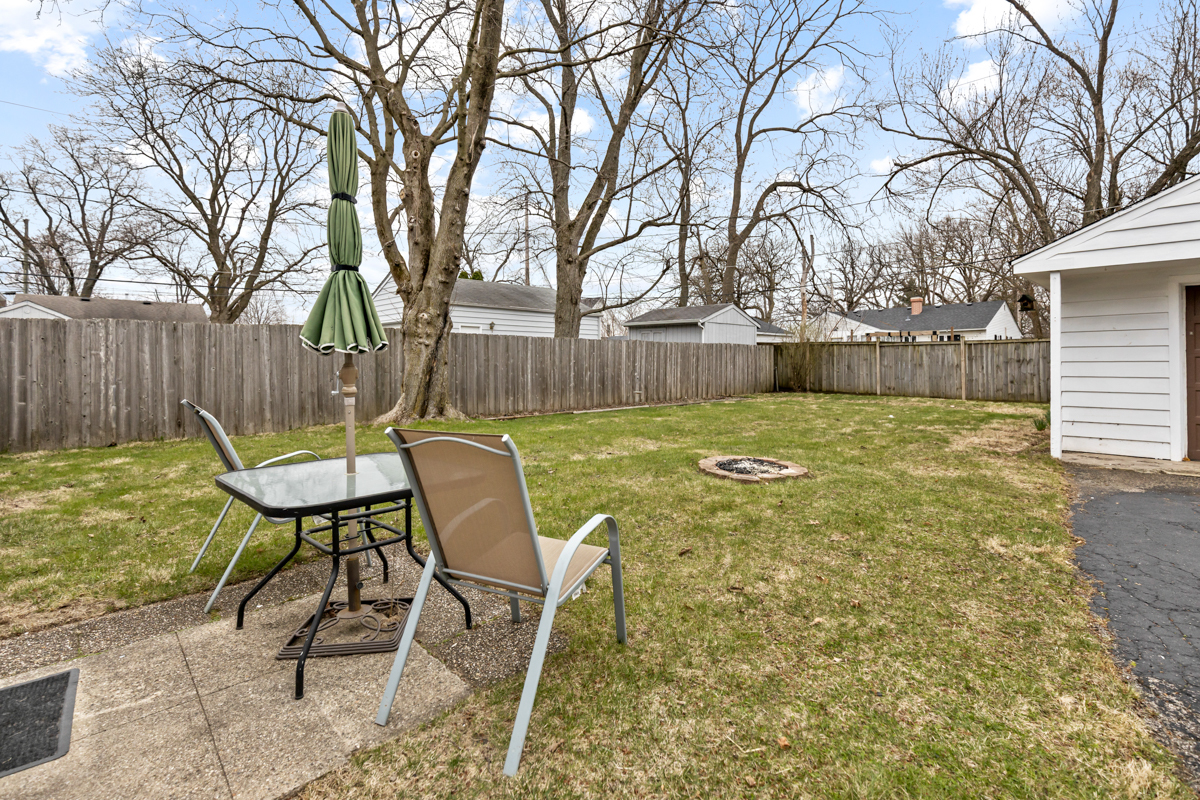 610 High Street Geneva, IL 60134 - Photo 16 of 18 a view of a chairs in backyard of house