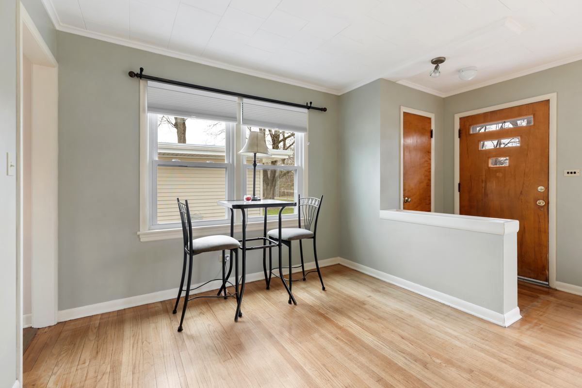610 High Street Geneva, IL 60134 - Photo 4 of 18 a workspace room with furniture and wooden floor
