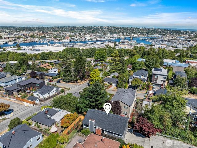 an aerial view of a city with lots of residential buildings