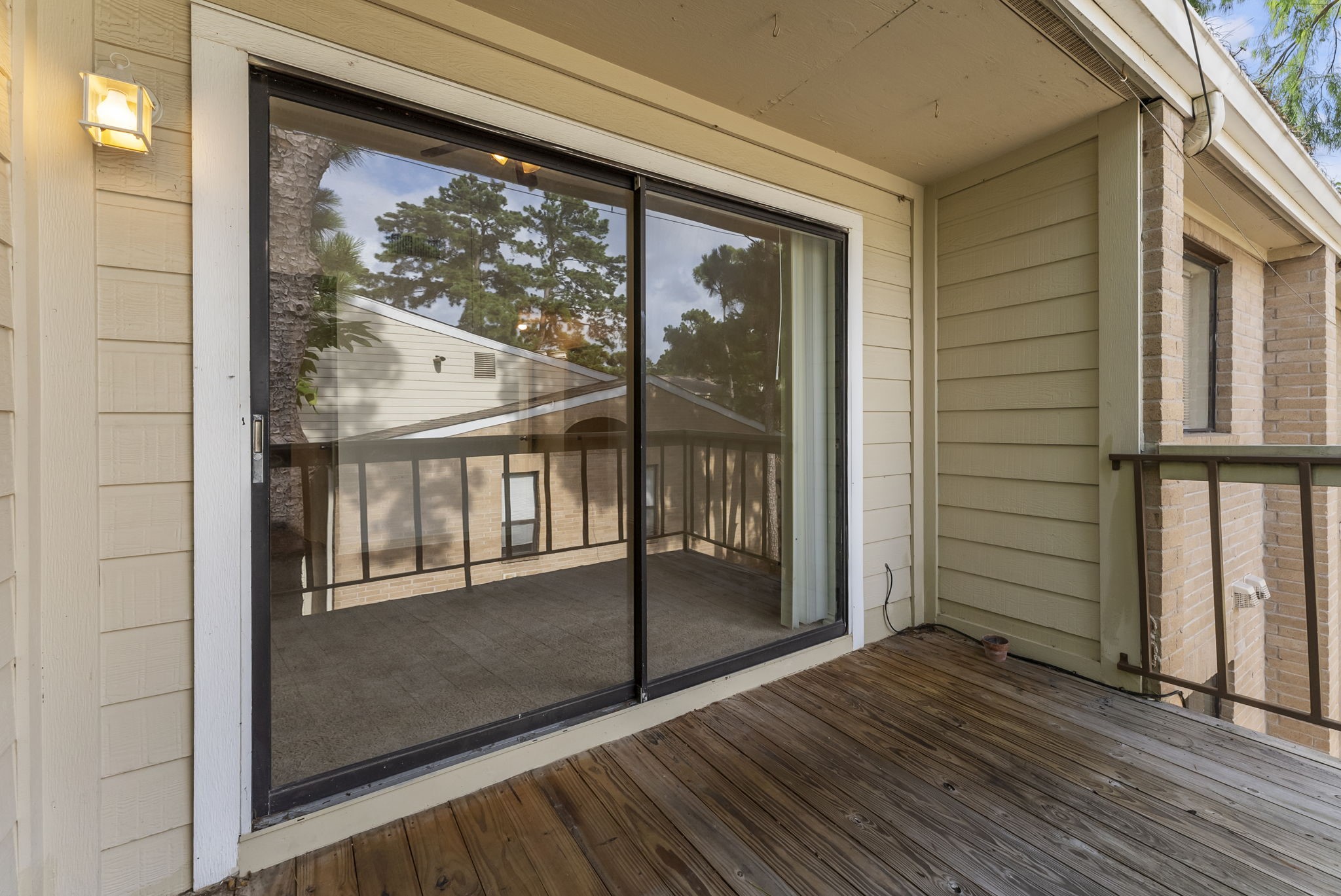 3500 Tangle Brush Drive, Unit 139 Spring, TX 77381 - Photo 14 of 22 an empty room with wooden floor and door
