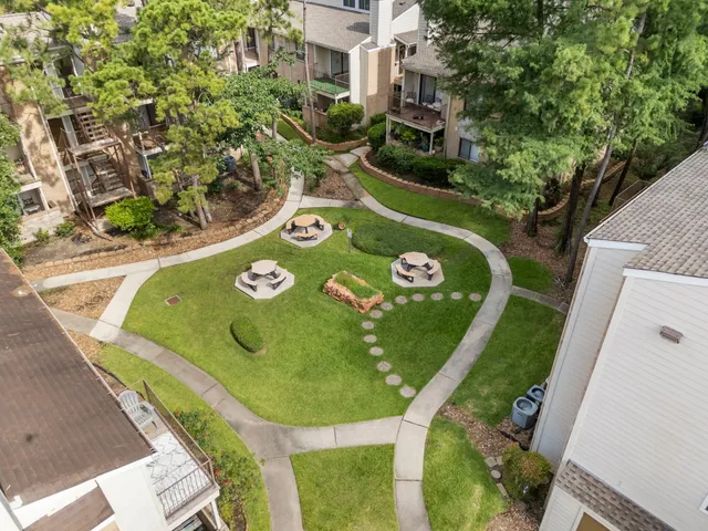 a view of a back yard of the house