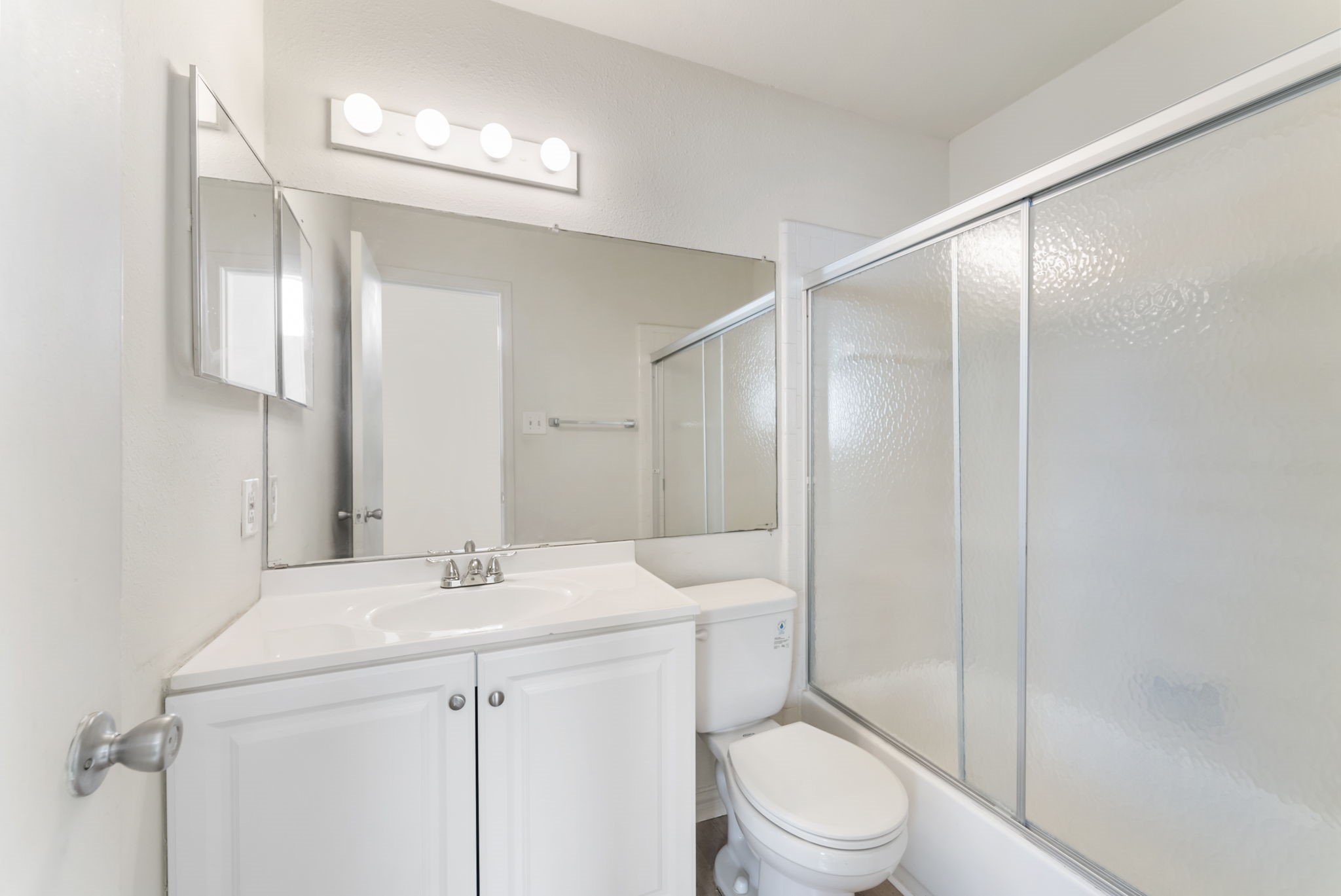 3500 Tangle Brush Drive, Unit 139 Spring, TX 77381 - Photo 9 of 22 a bathroom with a sink toilet and shower