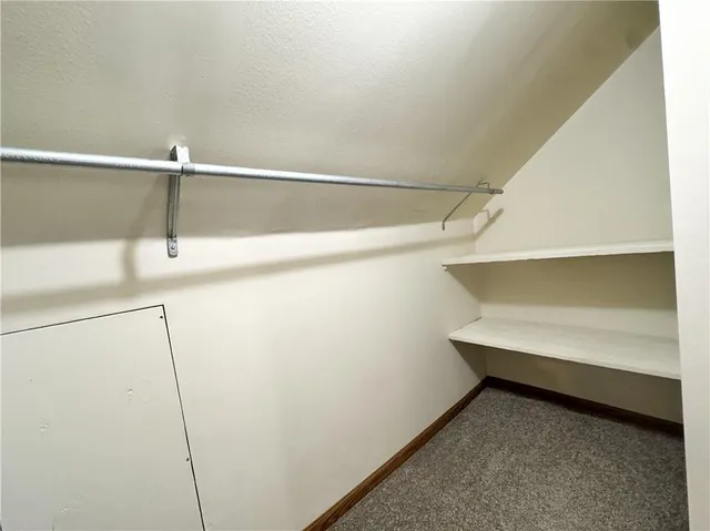 an empty room with window